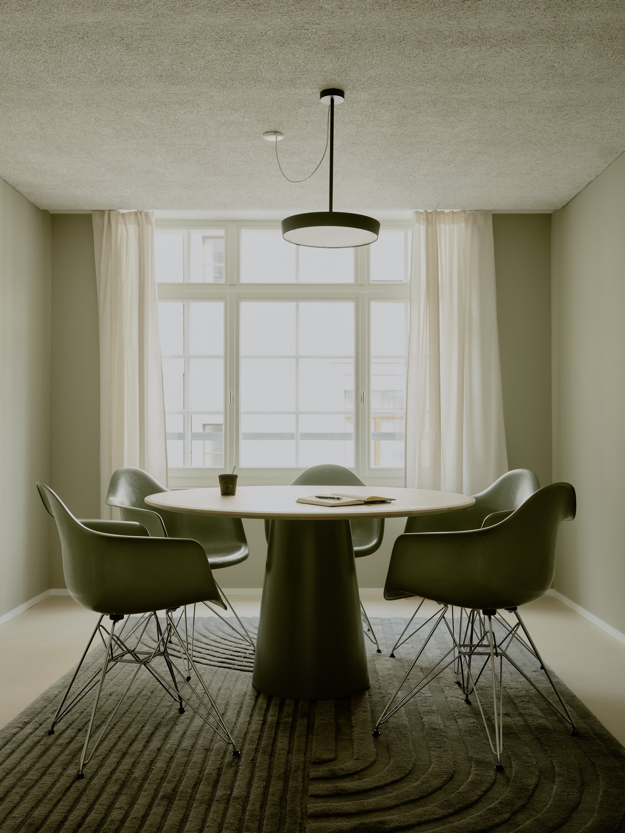 Spacious meeting room with conference table