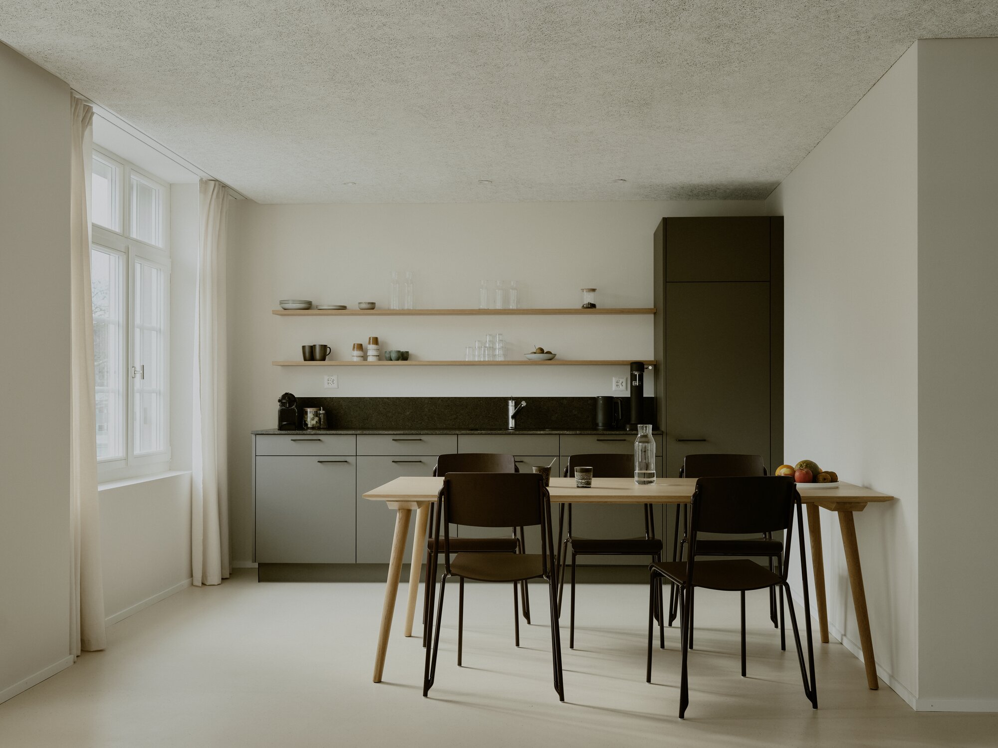 Modern shared kitchen with dining area